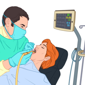 Dentist doing a dental treatment